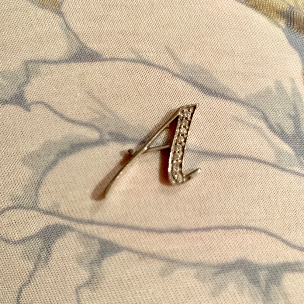 Diamond A 14 karat pendant
